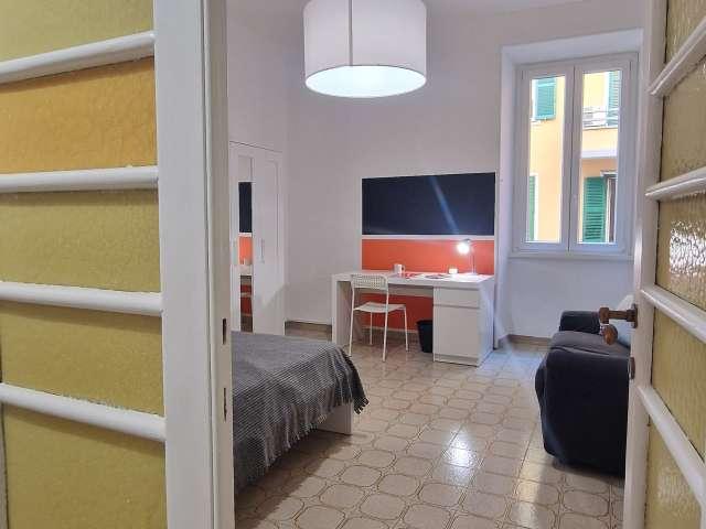 Camera in affitto in appartamento con 4 camere da letto a Roma
