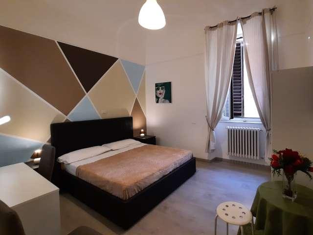 Camera in appartamento condiviso con 3 camere da letto nel Rione Castro Pretorio