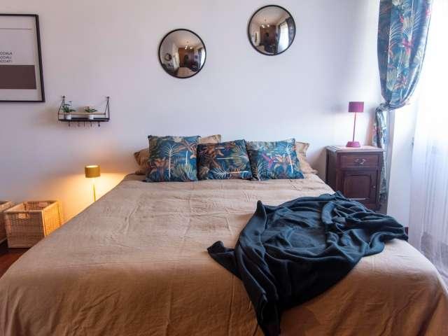 Camera in appartamento condiviso con 4 camere da letto a Tormarancia