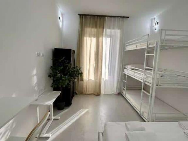Camera in appartamento condiviso con una camera da letto a Portello, Milano