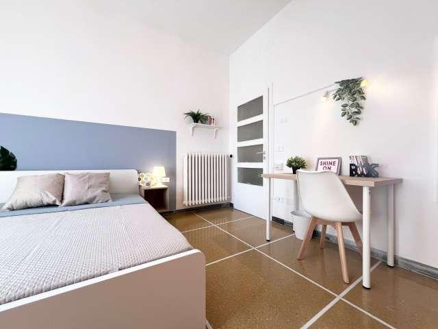 Camera in un appartamento condiviso con 3 posti letto a Bologna