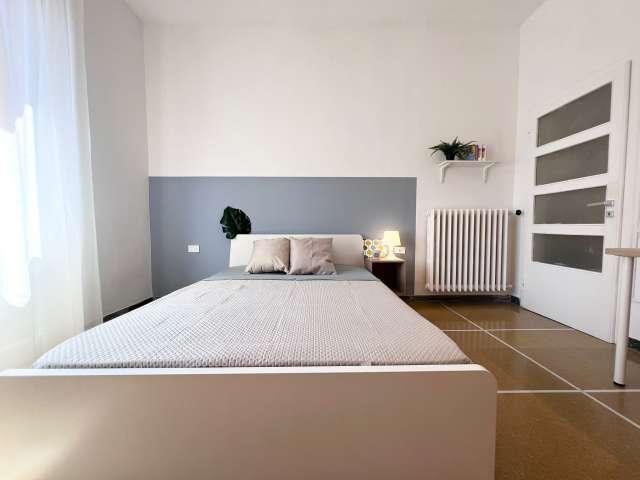 Camera in un appartamento condiviso con 3 posti letto a Bologna