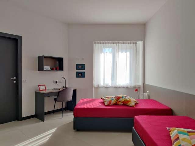 Camere e posti letto in affitto in appartamento con 5 camere da letto