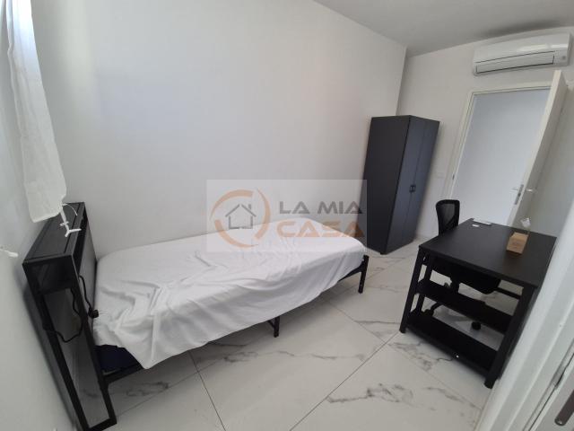 Camere singole con bagno privato