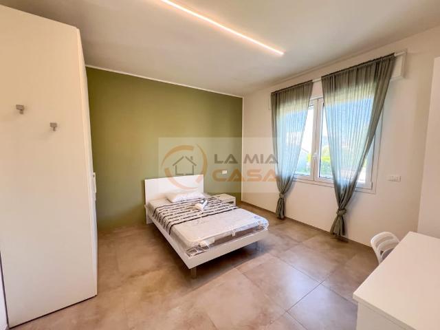 Camere singole in villetta con giardino