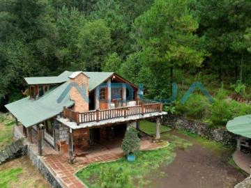 CABAÑA CON 8 HECTAREAS EN LA MONTAÑA