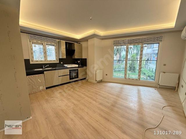 CADDEBOSTAN SAHİLDE SIFIR BİNADA SATILIK 1+1 BOŞ DAİRE