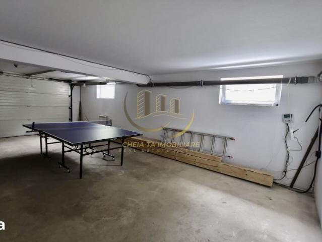 Casă individuală cu 4 dormitoare, grădină 850 mp și garaj dublu