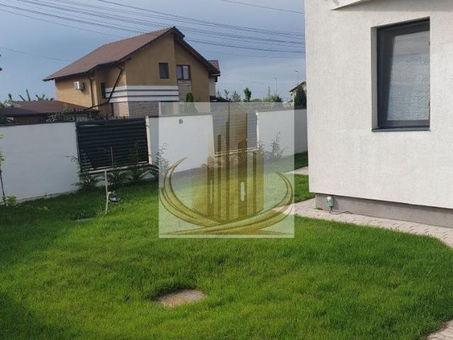 Casă modernă cu teren generos și garaj – Dumbrăvița