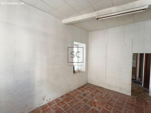 Casa adosada en el centro de Cariño