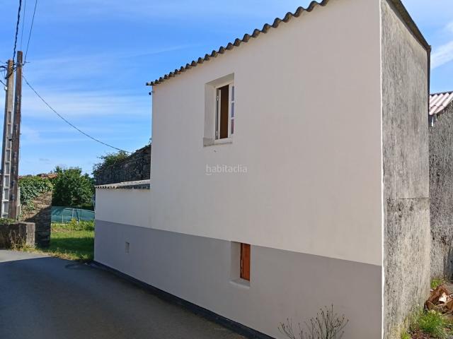 Casa adosada en venta en Carral. Casas adosadas.