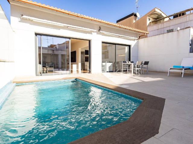 Casa adosada en Venta en Centre