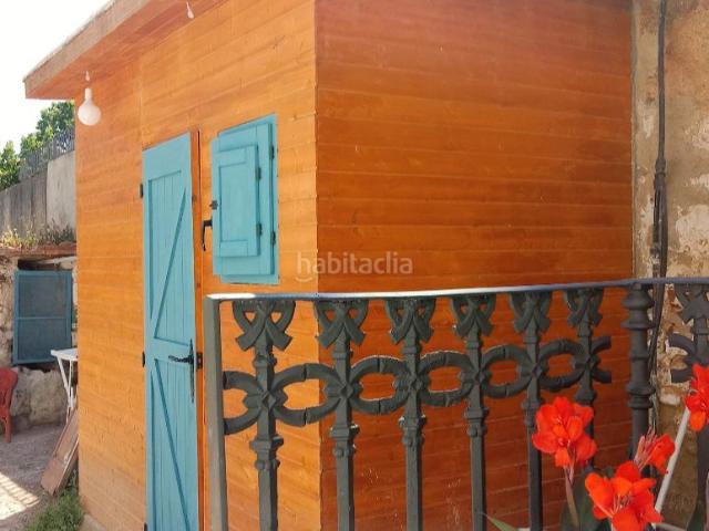 Casa adosada en venta en Vallirana. Casa de Piedra con encanto e historia en pleno centro de Vallirana. Casas adosadas.