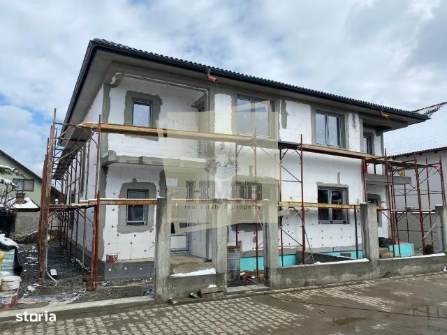 Casa cu 4 camere 2 bai si curte 180 mp in Selimbar
