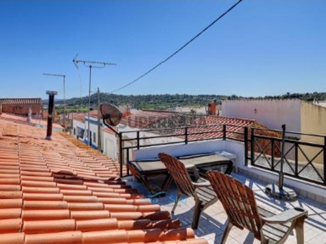 Casa com Terraço No Telhado e Vistas