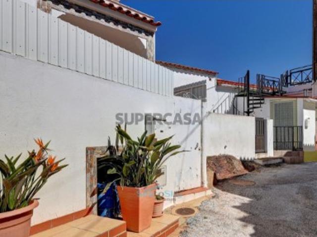 Casa com Terraço No Telhado e Vistas