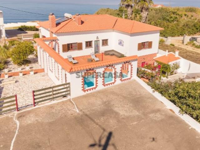 Casa com cinco quartos ou pousada com vista para o mar