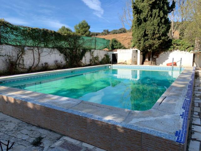 Casa con terreno en venta en Archidona, Rustica