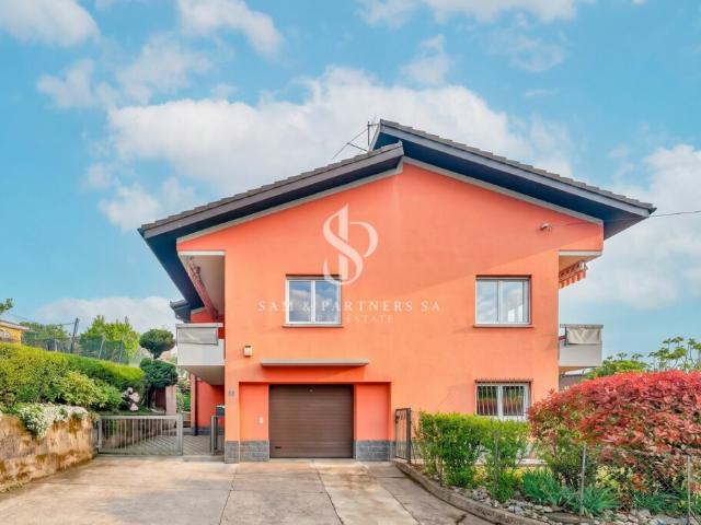 Casa con giardino