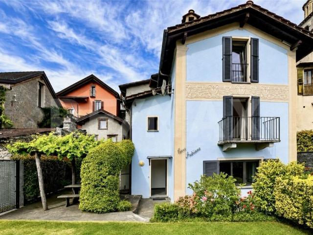 Casa con giardino e 4 posteggi