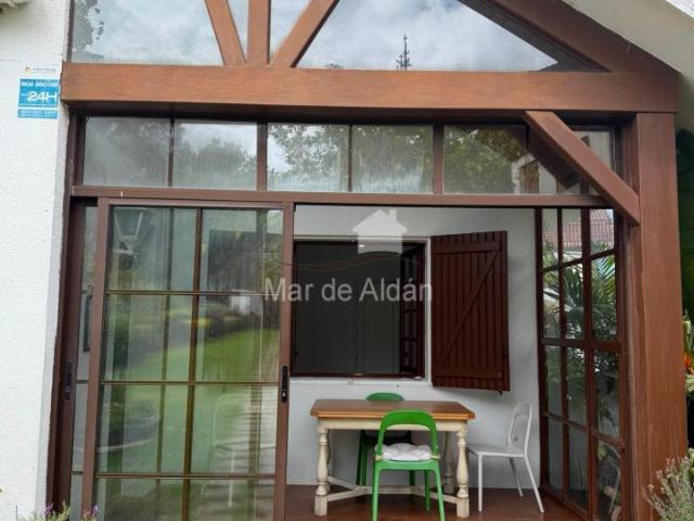 casa con jardin en la playa de nerga