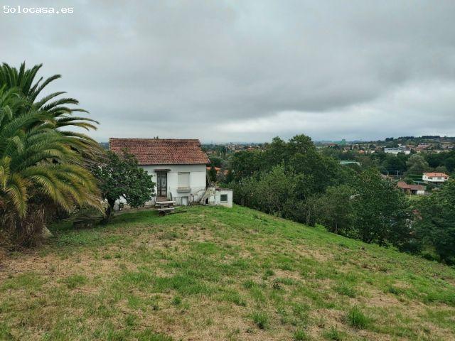 Casa con parcelas segregables