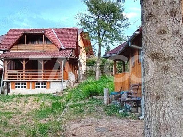 Casa de vacanta structura caramida si lemn 105 mpu 723 teren Tocile