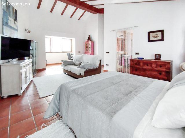 Casa de 265m2, 4 dormitorios, garaje, patio y 3 baños en Alfaz pueblo con vistas hasta el mar