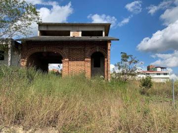 Casa en obra negra y terreno. Las Trancas