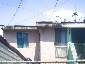 CASA EN PLANTA ALTA Y LOCAL COMERCIAL