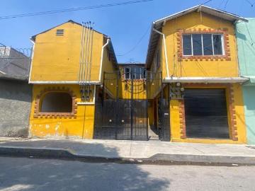 CASA EN VENTA CON DEPARTAMENTOS Y LOCALES COMERCIALES