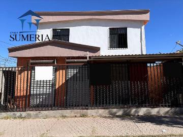 Casa en venta con dos locales comerciales