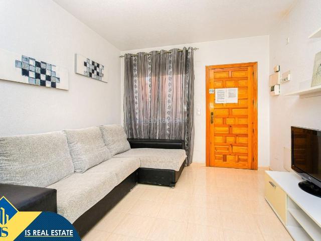 Casa en venta en Orihuela, Villamartín Las Filipinas. Bungalow con piscina comunitaria, en la provincia de Alicante, en la localidad de Orihuela Costa. 2 habitaciones 55 m² 5,2 kil. Casas.