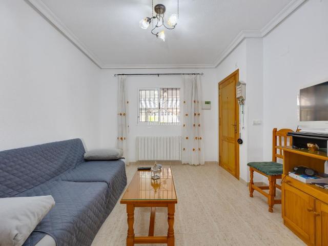 Casa en venta en Orihuela, Zeniamar Horizonte La Campana. Bungalow de 2 dormitorios y piscina comunitaria en Orihuela Costa. Casas.