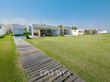 Casa en venta en PRIMERA FILA en Playa del Golf Asia con 4 dormitorios