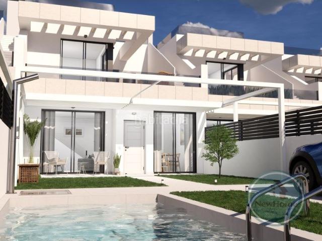 Casa en venta en Rojales. Adosados con piscina privada y garaje. Casas.