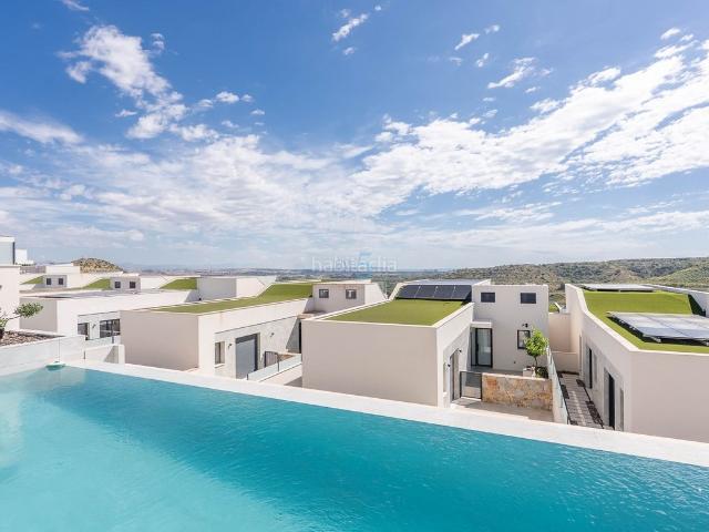 Casa en venta en Rojales. Villa de lujo de 5 dormitorios con piscina infinita, sistema de hogar inteligente y vistas al mar en Residencial Oceanic, Ciudad Q. Casas.