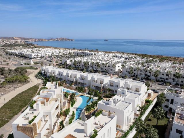 Casa en venta en San Juan de los Terreros. Vivienda de obra nueva con altas calidades, piscina y garaje en urbanización privada. Casas San Juan de los.