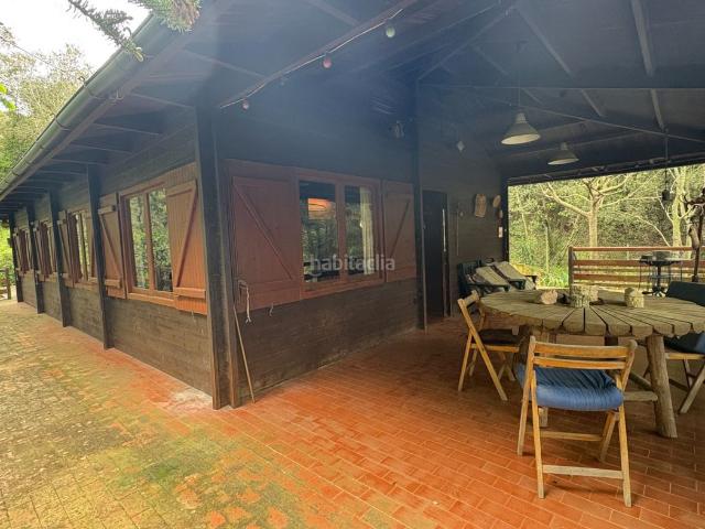 Casa en venta en Vallgorguina. CASA DE FUSTA ENVOLTADA DE NATURA. Casas.