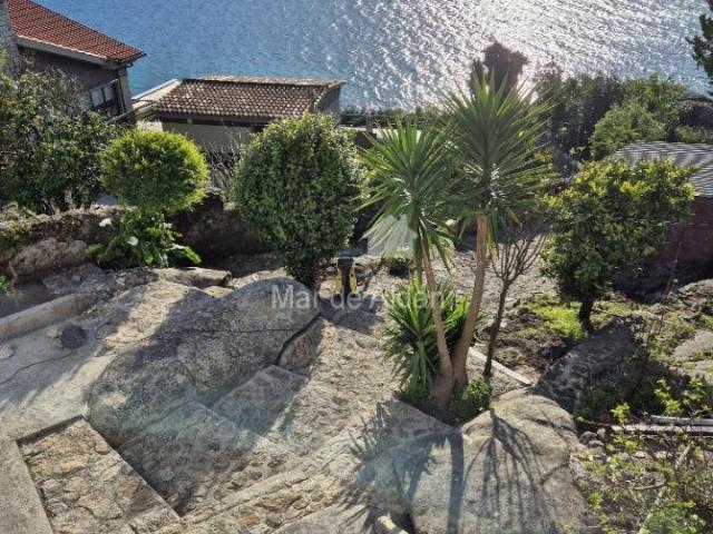 casa planta baja en la playa de cova de balea aldan
