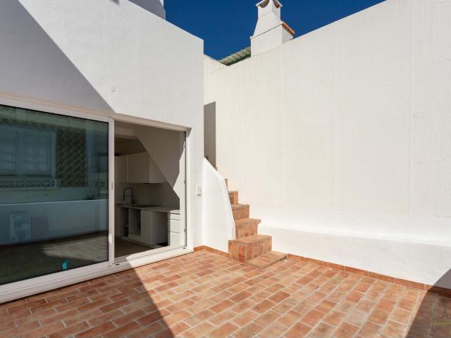 Casa típica em Olhão com três terraços