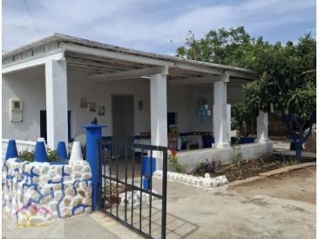 CASETA CON FINCA EN CAP I CORP