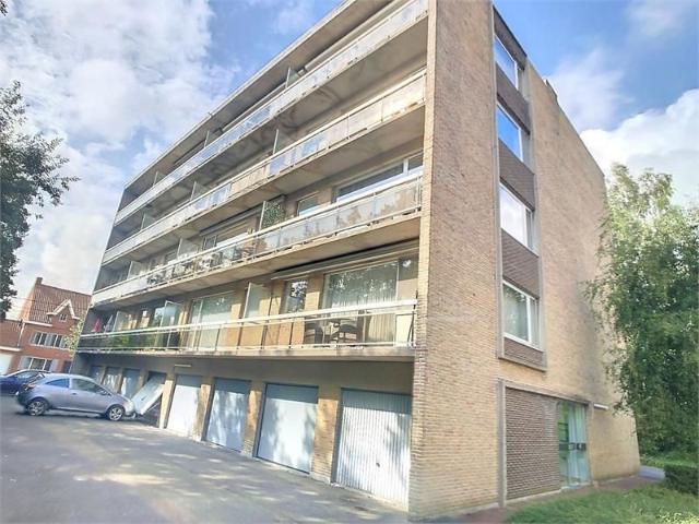 Centraal gelegen appartement met 2 slaapkamers en inpandige garage