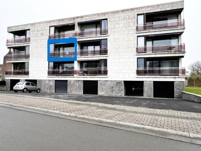 Centraal gelegen appartement met garage