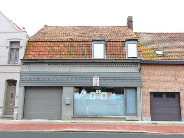 Centraal gelegen woning met 4 slaapkamers, tuin en garage