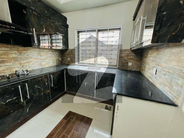 Centrally Located House In Bahria Town Phase 4 Is Available For sale