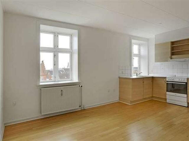 Centralt beliggende lejlighed på 56 m²