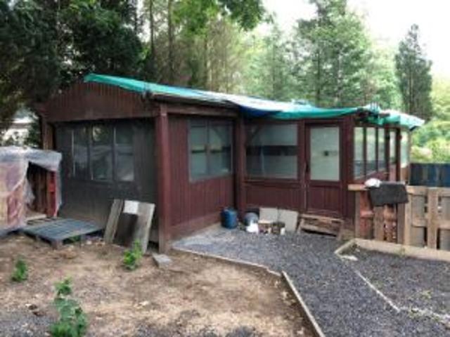Chalet avec veranda à vendre