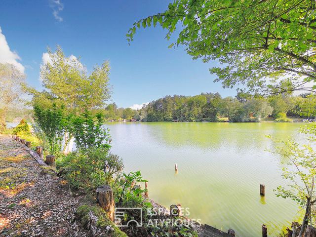 Chalet en bois avec terrasse et vue lac