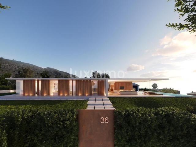 Chalet en venta en Finestrat, Golf Bahía. Casa de diseño minimalista en venta en Sierra Cortina. Chalets.